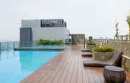 Swimming Pool 6 Minimalist and Comfy Studio at Embarcadero Bintaro Apartment By Travelio