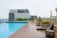 Swimming Pool Minimalist and Comfy Studio at Embarcadero Bintaro Apartment By Travelio