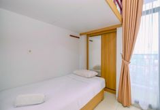 Bedroom 2 Homey and Minimalist Studio at Dave Apartment By Travelio