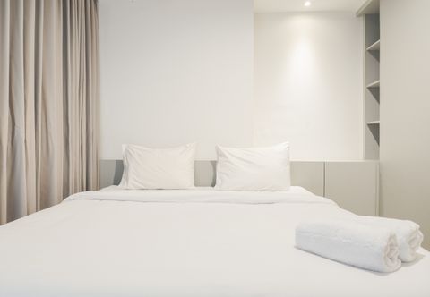 침실 Luxurious 1BR Apartment at West Vista By Travelio
