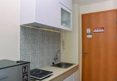Common Space 4 Nice and Elegant Studio at Evenciio Margonda Apartment By Travelio