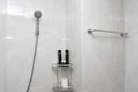 In-room Bathroom Nice and Elegant Studio at Evenciio Margonda Apartment By Travelio