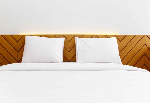 Bedroom Elegant and Fancy Studio at Patraland Urbano Apartment By Travelio