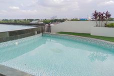 Swimming Pool Elegant and Fancy Studio at Patraland Urbano Apartment By Travelio