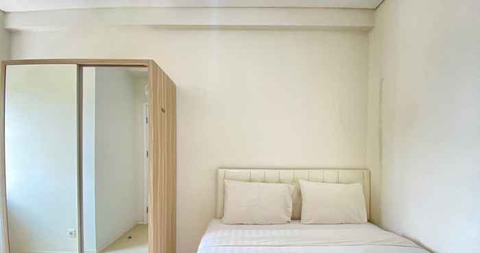 Bedroom Cozy 2BR at Parahyangan Residence Apartment By Travelio