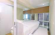 Kamar Tidur 2 Comfort and Minimalist 2BR at Tamansari The Hive Apartment By Travelio