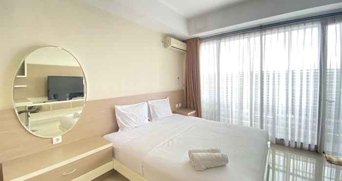 Bedroom Pleasant Studio Near ITB at Beverly Dago Apartment By Travelio