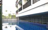 Swimming Pool 7 Pleasant Studio Near ITB at Beverly Dago Apartment By Travelio