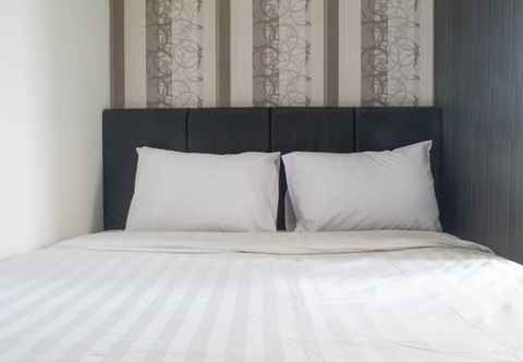 Bedroom Comfy and Best Deal 2BR Apartment at Puri Mas By Travelio