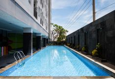 Swimming Pool 7 Comfy and Best Deal 2BR Apartment at Puri Mas By Travelio