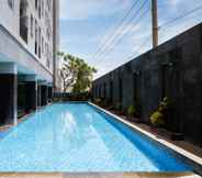 Swimming Pool 7 Comfy and Best Deal 2BR Apartment at Puri Mas By Travelio