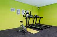 Fitness Center Comfy and Best Deal 2BR Apartment at Puri Mas By Travelio