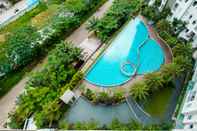 Swimming Pool Scenic 1BR at Mustika Golf Residence Apartment By Travelio