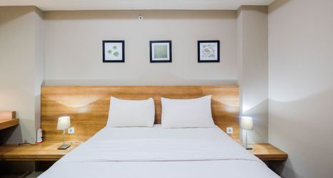 Bedroom 2 Scenic 1BR at Mustika Golf Residence Apartment By Travelio