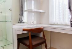 Bedroom 2 Cozy and Nice Studio at Springlake Summarecon Bekasi Apartment By Travelio