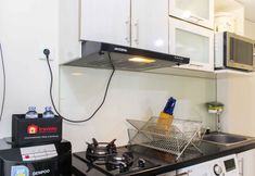 Bedroom 4 Cozy and Nice Studio at Springlake Summarecon Bekasi Apartment By Travelio