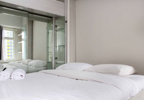 Bedroom Cozy and Nice Studio at Springlake Summarecon Bekasi Apartment By Travelio