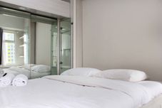 Bedroom Cozy and Nice Studio at Springlake Summarecon Bekasi Apartment By Travelio