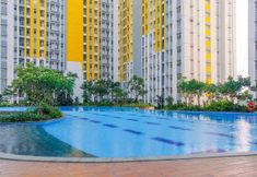 Swimming Pool 6 Cozy and Nice Studio at Springlake Summarecon Bekasi Apartment By Travelio