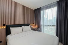 침실 Comfort and Elegant 1BR at Ciputra World 2 Apartment By Travelio Premium