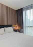 BEDROOM Comfort and Elegant 1BR at Ciputra World 2 Apartment By Travelio Premium