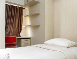 Bedroom 2 Nice and Cozy Studio at Springlake Summarecon Bekasi Apartment By Travelio