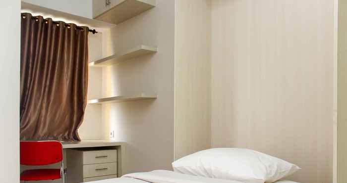 Kamar Tidur Nice and Cozy Studio at Springlake Summarecon Bekasi Apartment By Travelio