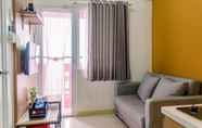 Common Space 3 Cozy and Warm 2BR at Green Pramuka City Apartment By Travelio