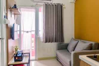 Common Space 4 Cozy and Warm 2BR at Green Pramuka City Apartment By Travelio