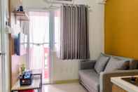 Common Space Cozy and Warm 2BR at Green Pramuka City Apartment By Travelio