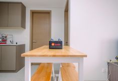 Common Space 4 Minimalist and Comfortable 2BR at Gold Coast Apartment By Travelio