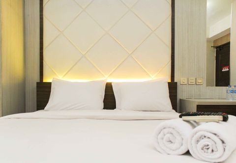 침실 Comfort Studio at Metropark Condominium Jababeka Apartment By Travelio