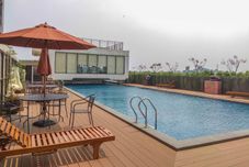 Swimming Pool Cozy Living and Comfortable Studio Room Apartment at Dave By Travelio