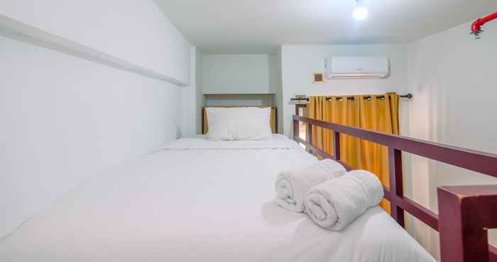 Kamar Tidur Cozy Living and Comfortable Studio Room Apartment at Dave By Travelio