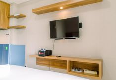 Khu vực công cộng 2 Comfy Studio Apartment at Amazana Serpong By Travelio