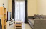 Common Space 3 Serene and Comfort 2BR at Meikarta Apartment By Travelio