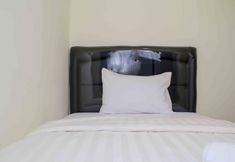 Bedroom 2 Serene and Comfort 2BR at Meikarta Apartment By Travelio
