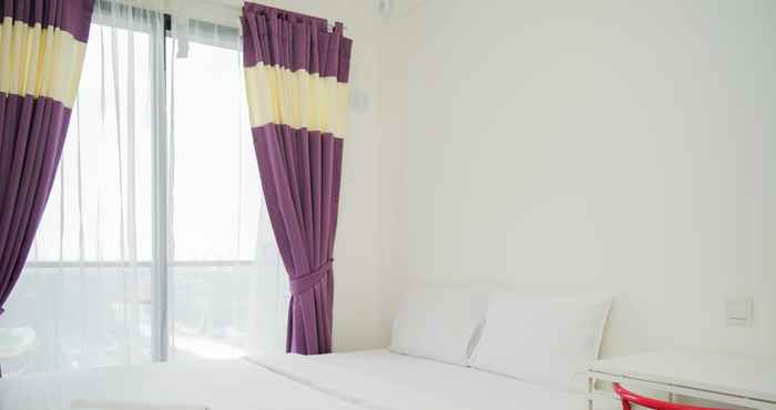 Kamar Tidur Pleasurable Studio Apartment at Sky House BSD By Travelio