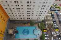 Swimming Pool Combine and Minimalist 2BR at Green Pramuka City Apartment By Travelio