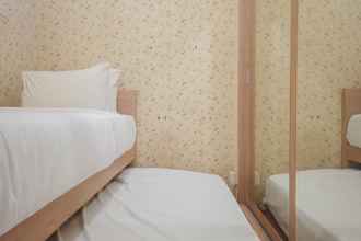 Kamar Tidur 4 Combine and Minimalist 2BR at Green Pramuka City Apartment By Travelio