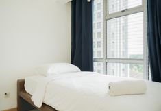 Bilik Tidur 2 Cozy and Restful 2BR Apartment at M-Town Residence By Travelio