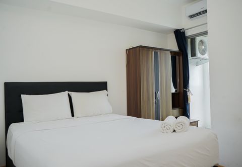 Bilik Tidur Cozy and Restful 2BR Apartment at M-Town Residence By Travelio