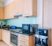 Common Space 5 Comfortable and New Furnished 2BR at The Mayflower Apartment By Travelio