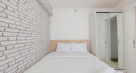 Bedroom 2 Nice and Comfort 2BR at Bassura City Apartment By Travelio