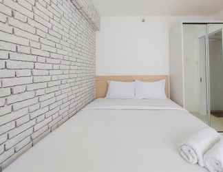 Bedroom 2 Nice and Comfort 2BR at Bassura City Apartment By Travelio