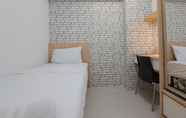 Bedroom 2 Nice and Comfort 2BR at Bassura City Apartment By Travelio