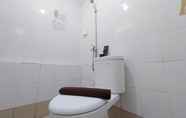 In-room Bathroom 5 Nice and Comfort 2BR at Bassura City Apartment By Travelio