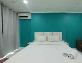 Kamar Tidur 2 Minimalist and Comfy Studio at City Home MOI Apartment By Travelio