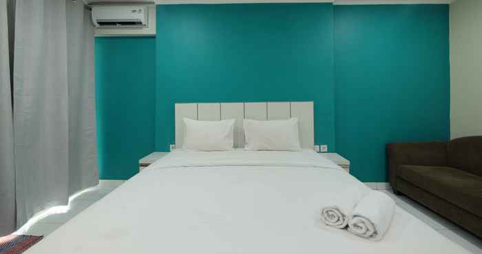 Bilik Tidur Minimalist and Comfy Studio at City Home MOI Apartment By Travelio