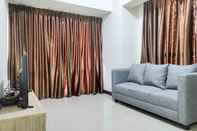 Lobby Comfy and Big 3BR at Vida View Apartement By Travelio